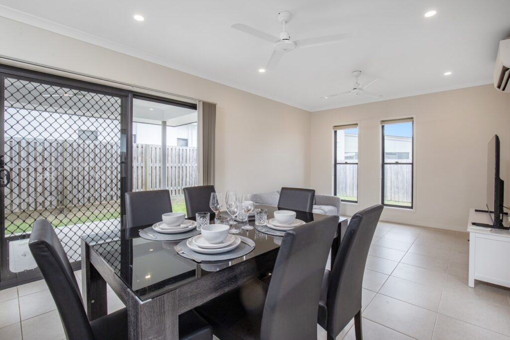 This stunning two-floor Airbnb listing combines comfort and style with a prime location close to hotspots like Dream Walk, Westfield Coomera, and more.