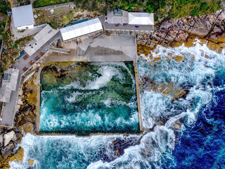 Wylie’s Baths: 
Just a short walk south of the beach, this heritage-listed pool combines stunning scenery with a rich history.